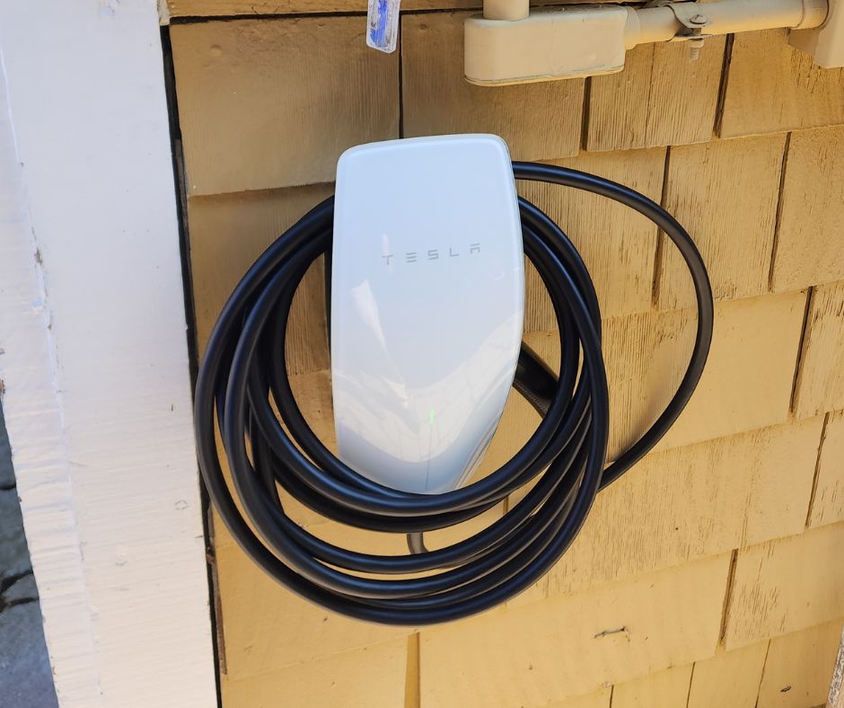 TESLA EV Charger installed in garage of Pacific Beach home by nearby electrician in San Diego