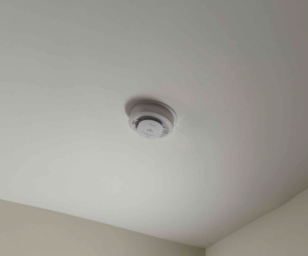 A ceiling smoke detector.