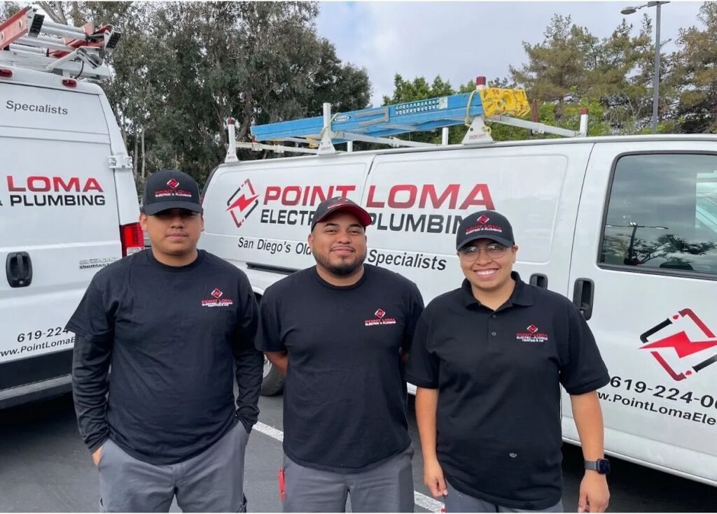 Point Loma Home Pros team in front of branded service vans