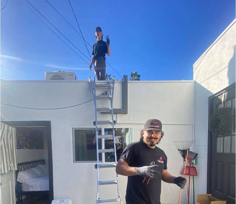 Point Loma Home Pros technicians installing a mini split system, demonstrating the hands-on expertise homeowners should look for when hiring.