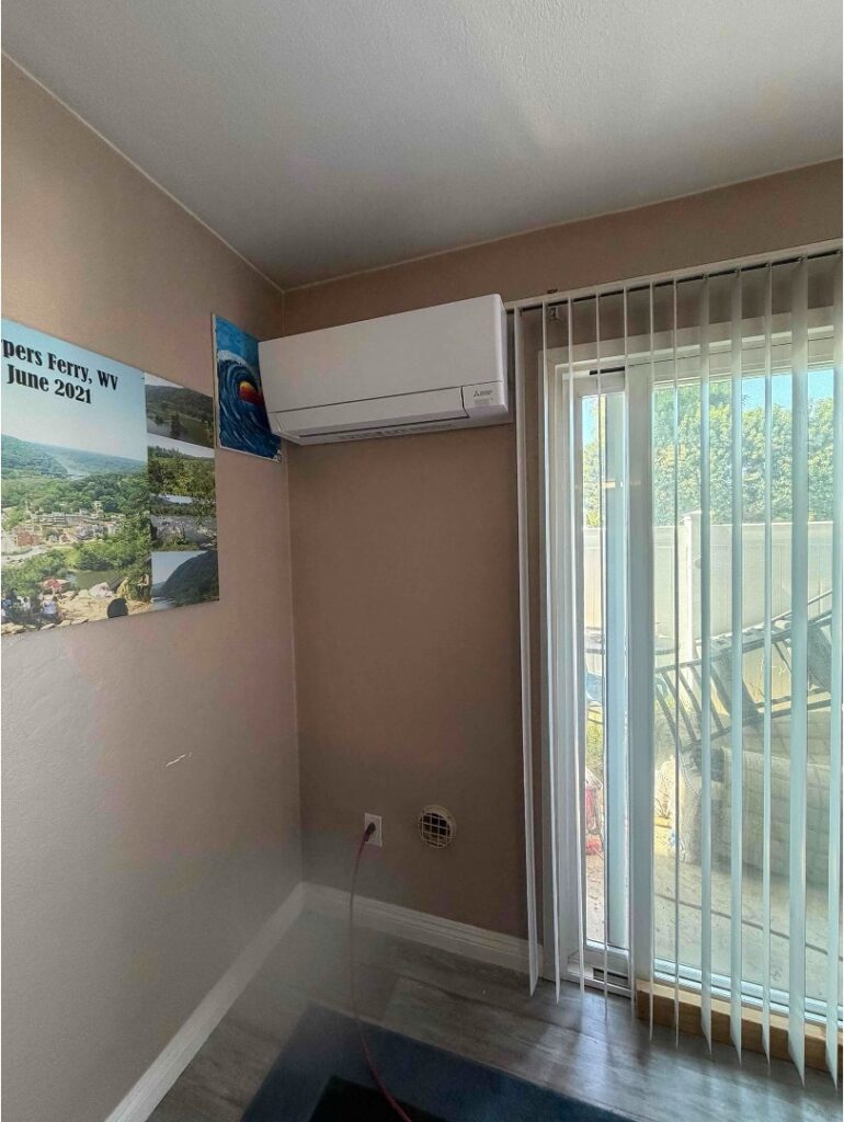 Indoor ductless mini-split head installed to cool a room without ductwork.