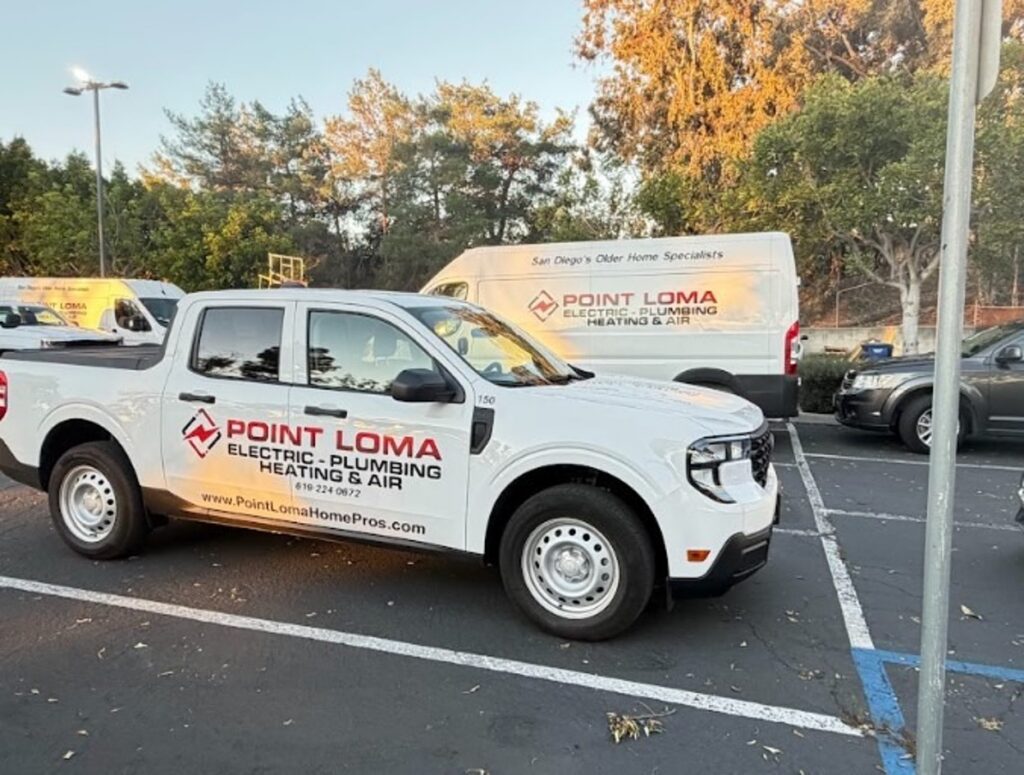 White Point Loma Home Pros service truck and van parked in a lot