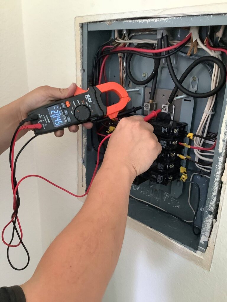 An expert technician from Point Loma Home Pros carrying out an electrical panel upgrade in El Cajon.