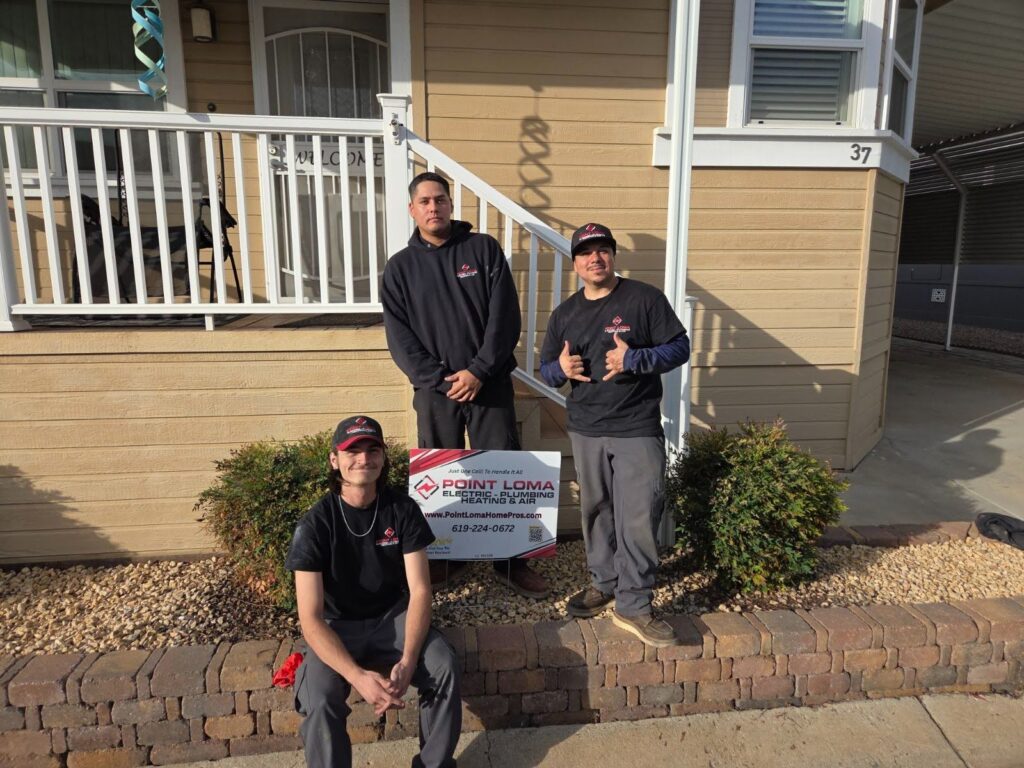 Members of the team at Point Loma Home Pros posing for a picture after completing a job.
